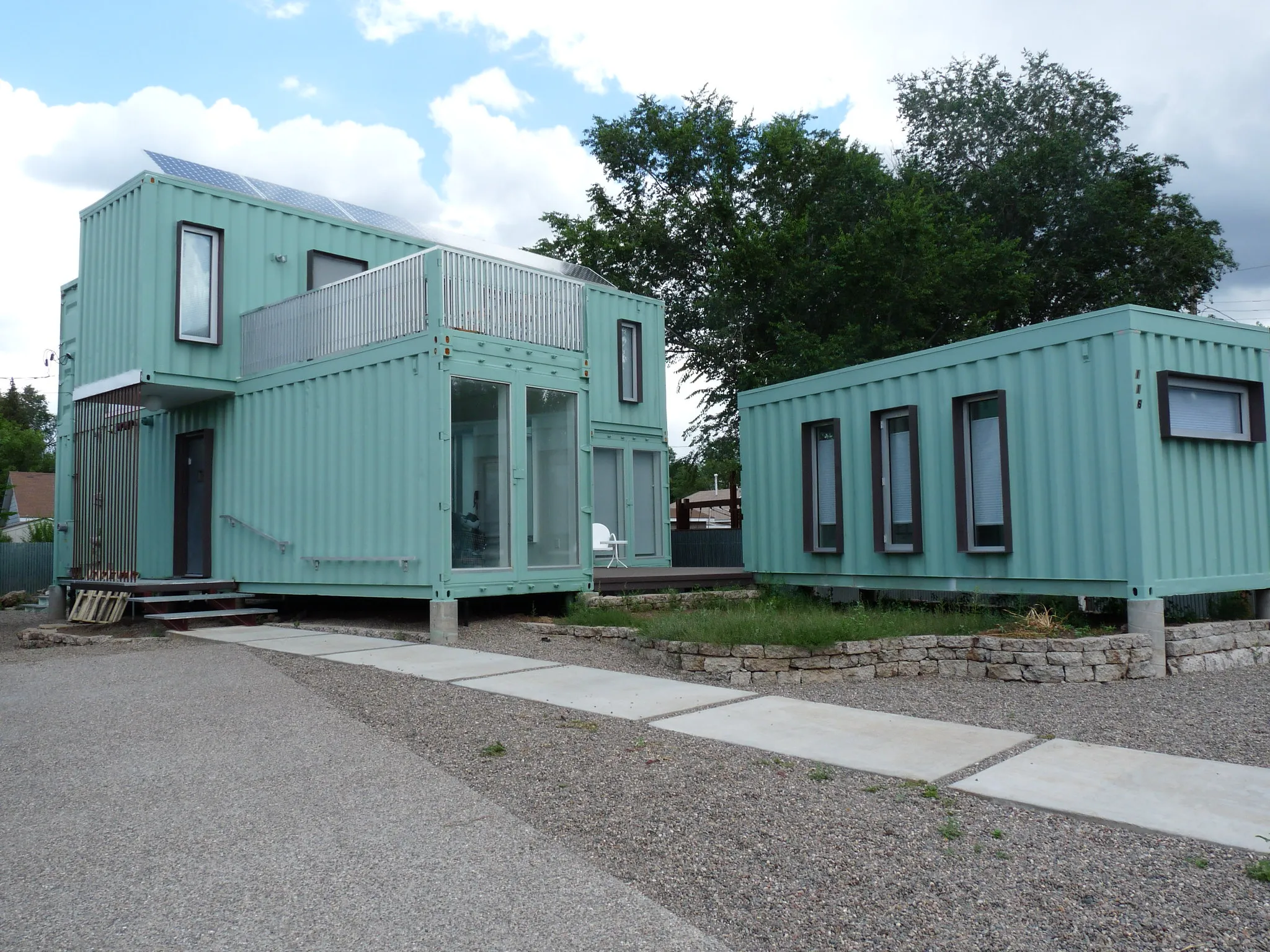 '<a href="https://flickr.com/photos/glamourschatz/6045962800" title="Jones-Glotfelty Shipping Container House, Flagstaff AZ">Jones-Glotfelty Shipping Container House, Flagstaff AZ</a> by <a href="https://flickr.com/people/glamourschatz">Glamour Schatz</a> is licensed under <a href="https://creativecommons.org/licenses/by/2.0/">CC BY</a>'